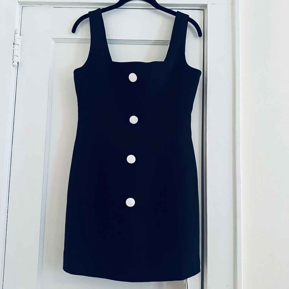 Elegant Black Dress with White Accents